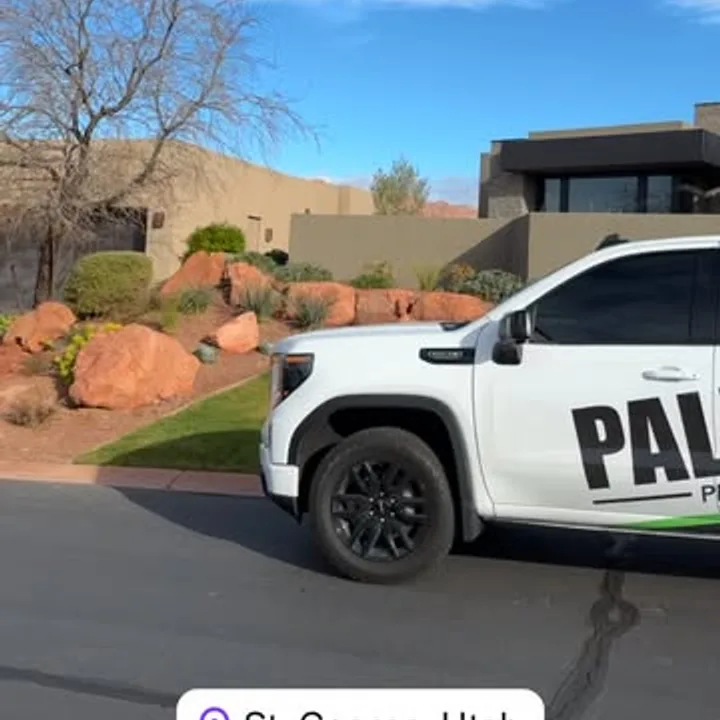 Pallas Pest Control branded truck at a St. George, Utah home